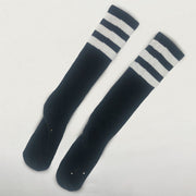 Audra's Black "RAMPAGE" Socks (one pair) + Autographed STEELBOOK