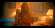 AUCTION Lot 24: Arielle's Orange "Watch Me Muck" shirt worn on-screen